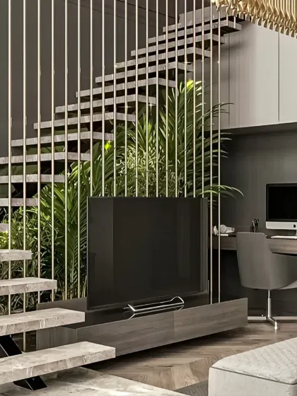 An example of how we reclaim unused space. This area under a modern staircase was converted into a functional entertainment and work zone, featuring a custom TV unit and a built-in desk, proving that no corner is too awkward to be useful.