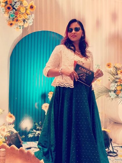 A confident pose with my Emcee booklet. I am always prepared and ready to deliver a flawless event.