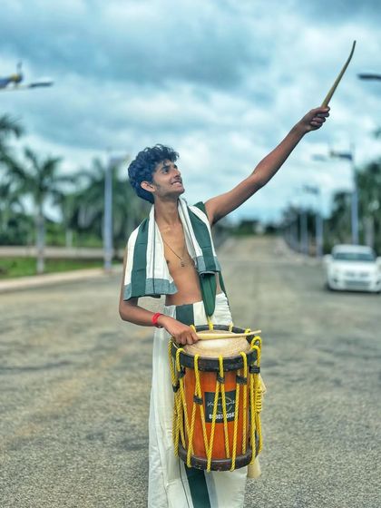 Reaching for the sky. This pose captures the ambition and passion of our artists.