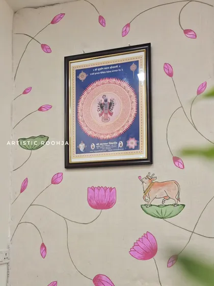 The full view of the Pichwai mural around the Shrinath ji frame, creating a complete spiritual centerpiece for the shop.