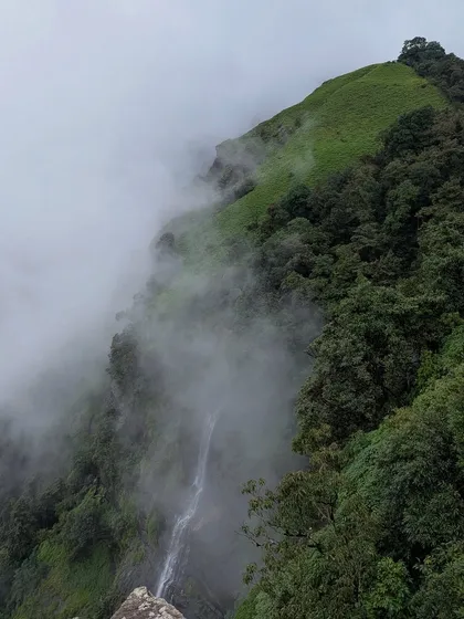 The magnificent Bandaje Arbi waterfalls as seen from the trail. This is the ultimate reward on the Bandaje trek, a true trekker's paradise.