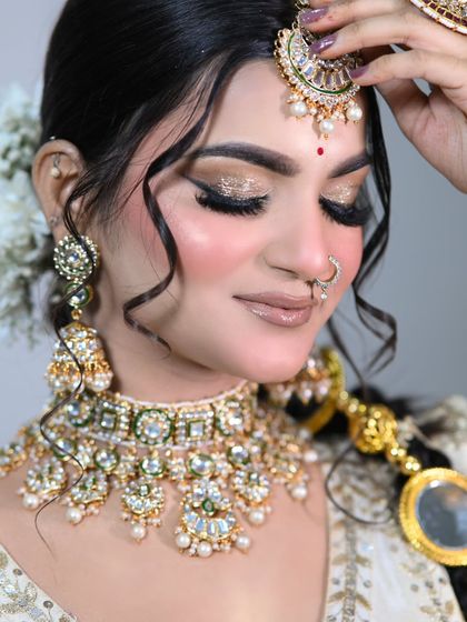 The eye makeup in detail. A soft wash of shimmer on the lids and perfectly blended liner create a sophisticated and pretty look.