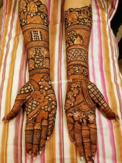 A full-arm design with a beautiful mix of floral, checkerboard, and traditional Indian patterns.