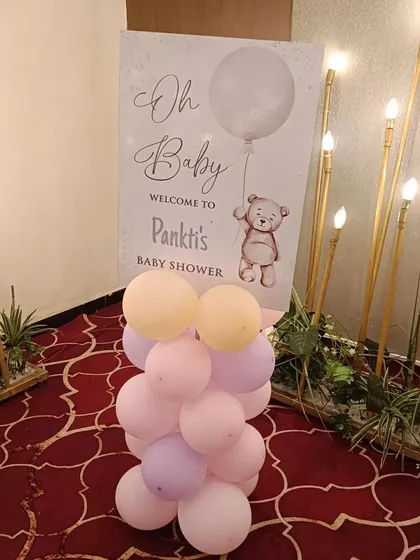 A charming "Oh Baby" welcome sign with a teddy bear theme for a baby shower.