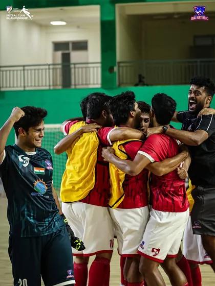 A massive team hug after the final whistle. We did it, together.