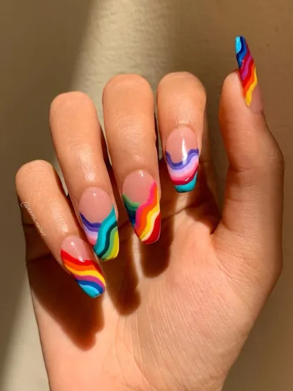 This vibrant rainbow design shows the level of intricate, freehand line work we cover in the course. I will teach you how to control your brush to create clean, flowing lines and bold color combinations on a negative space background.