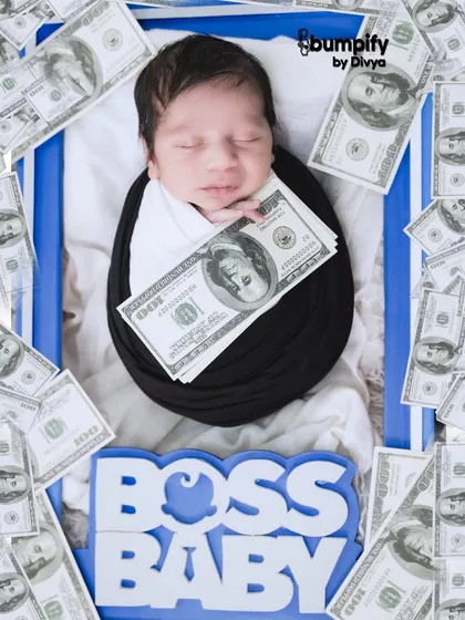 "Chhota packet, bada business." This fun 'Boss Baby' theme is perfect for newborns with big personalities, complete with a suit-like wrap and a prop full of money.