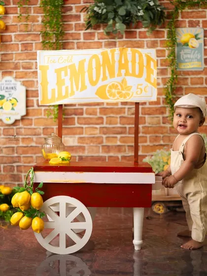 The cutest little entrepreneur at his very own lemonade stand. This vintage-inspired theme is a sweet and charming idea for a summer milestone session.