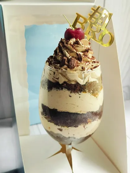 My Mocha Mirage Delight, created specially for Rakhi. It's an elegant dessert glass layered with chocolate cake, coffee mousse, almond praline, caramel, and chocolate chunks.
