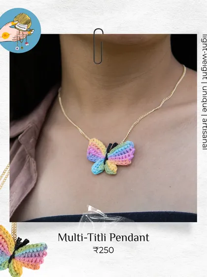 A customer favorite, the multi-color 'Titli' pendant. It's a bestseller for a reason, adding so much charm to any outfit.