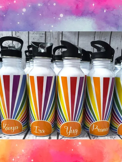 Personalization is at the heart of what I do. These vibrant, rainbow-themed stainless steel water bottles are a perfect example. I can add each child's name, making every gift feel special and unique. They are a practical and cheerful party favor that kids will use long after the party.