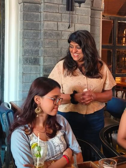 Our founder, Seena, chatting with volunteers. These events are a special time for connection and gratitude.