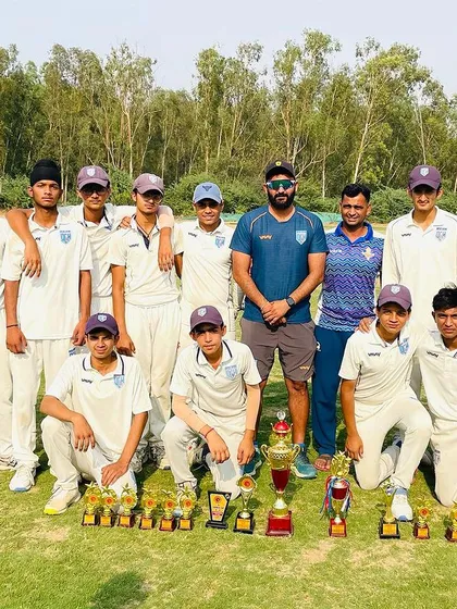 The full team with their trophies after another successful tournament.