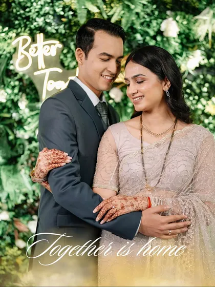 "Together is home." This intimate portrait captures the essence of their relationship, with a custom neon sign we arranged as part of their reception decor.