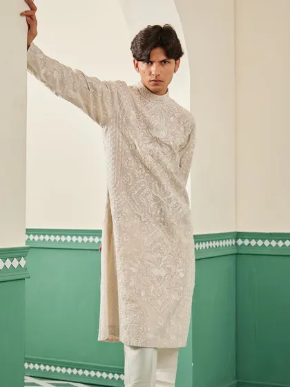 A full-length pose in the beige embroidered kurta, a classic and versatile addition to your wardrobe.