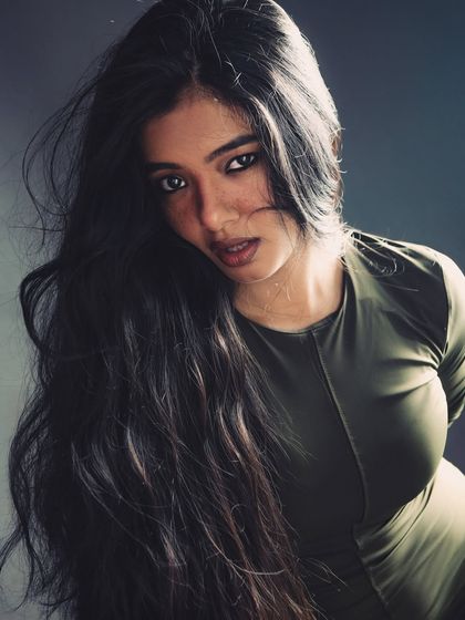 This shot is all about capturing the wild, untamed movement of the hair. I used a fan and fast shutter speed to freeze the motion, creating a powerful image that feels both chaotic and beautiful.