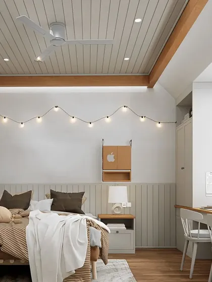 A cozy and inviting bedroom with a Scandinavian feel. The design features a slatted wood ceiling, wainscoting on the walls, and charming string lights, creating a warm and rustic retreat.