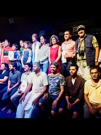 A group photo of the entire cast and crew with our special guest, Siri Ravikumar. A moment of celebration and pride for everyone involved.