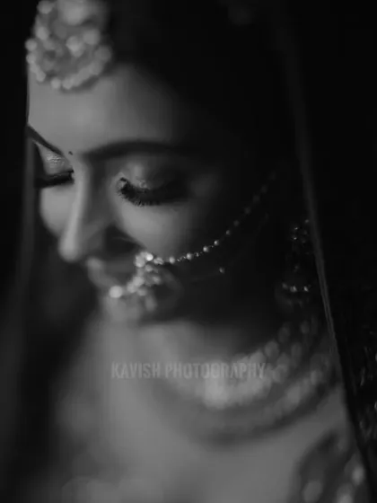 The same portrait in timeless black and white, emphasizing the emotion and texture.