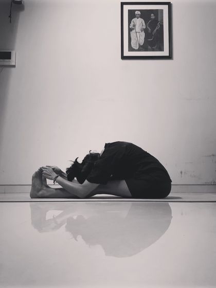Paschimottanasana, or the seated forward fold, is a deep stretch for the entire back of the body. Years ago, I couldn't touch my toes; this pose taught me patience and the art of surrender.