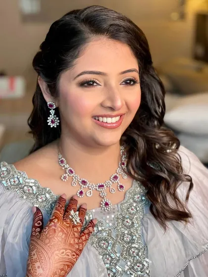 Another shot of this pretty Roka bride. The soft makeup perfectly complements her diamond and ruby jewelry.