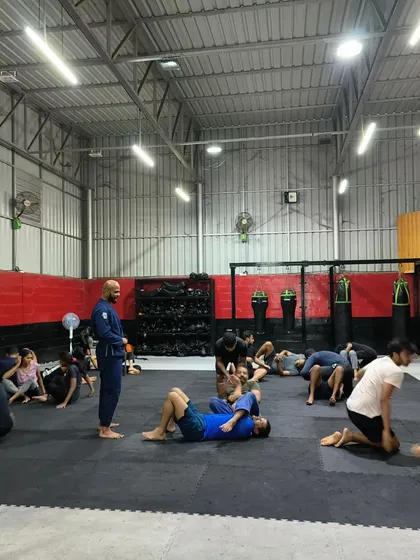 This picture captures the collaborative learning environment of our group sessions. We encourage students to work together, share techniques, and help each other grow towards a shared mission of improvement.