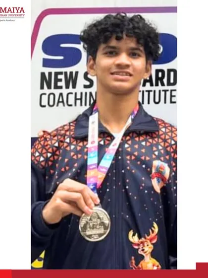 Manas Prabhakar Shinde holds his silver medal won in the 4x400m relay at the 69th National School Games.