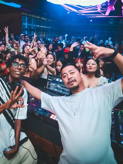 Posing with artists and the crowd behind us. These nights are a collaboration, bringing together people from all over the Northeast to party in Mumbai.