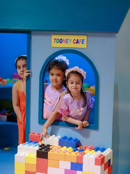 The Tooney Cafe crew is ready to build. Combining our block area with the cafe leads to all sorts of creative play.