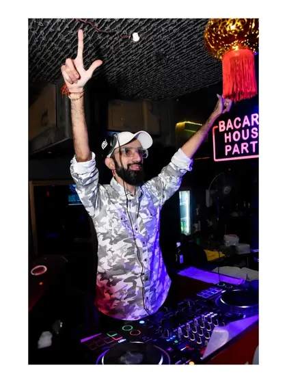 Hands in the air, feeling the music. I believe music is a spiritual language that brings peace and abolishes strife.