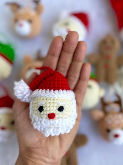 These mini Christmas ornaments are perfect for decorating your tree. The set includes tiny versions of Santa, reindeer, elves, and gingerbread men, all handmade with love.