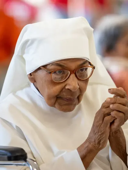 A close-up of one of the residents at The Little Sisters of the Poor, her expression showing deep appreciation for the live music. Our students' performances are designed to touch hearts and bring comfort and joy.