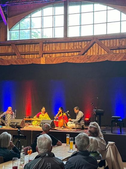 A view from the audience at our concert in Sontheim, Germany. The stage lighting and the rustic wooden hall created a magical atmosphere for the performance.