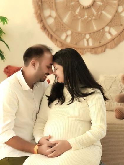 Our boho corner, complete with teddy bears and lush plants, provides a cozy and adorable setting for romantic and sweet couple's portraits.