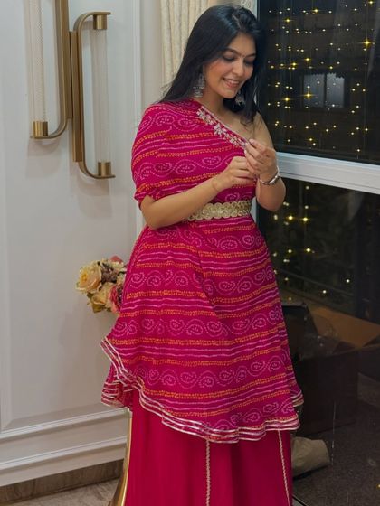 A full-length view of my pink sharara set, a perfect outfit for any festive celebration. The flowy silhouette is both comfortable and flattering.