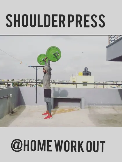 The last few reps are what make the muscle grow. This is a shoulder press, a great exercise for building punching power and shoulder stability.