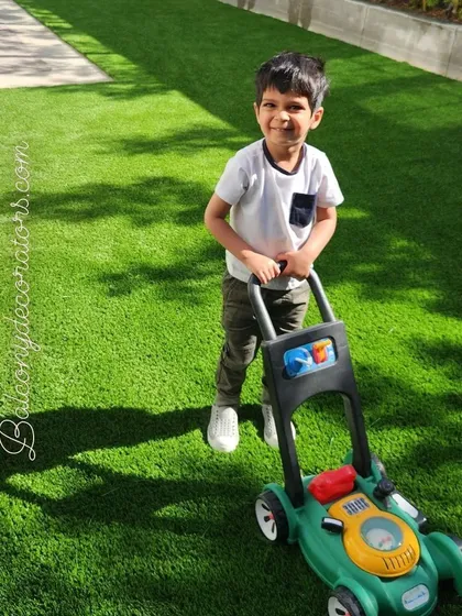 My artificial grass isn't just for looks; it's a safe and clean play area for your bachhon. It's soft, durable, and completely mess-free, so you can let them play without any jhanjhat.