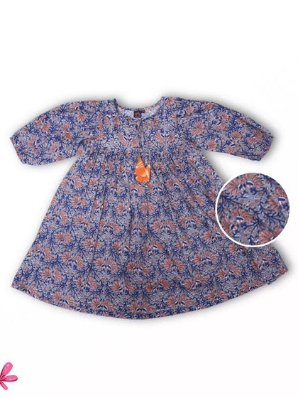 This floral dress with balloon sleeves is another one of my summer favorites. The print is delicate and the style is classic, making it a timeless piece for your girl's wardrobe.