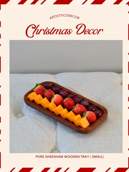 A pure sheesham wooden tray, perfect for serving fruits or a cheese platter during the holidays. Its natural wood grain adds a rustic and warm touch to your festive spread.