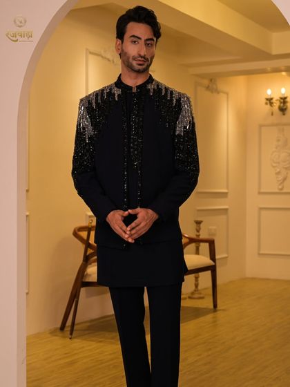 The complete ensemble, showing how the embellished jacket, kurta, and trousers come together for a polished and impactful party look.