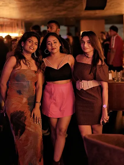 A group of friends enjoying their Saturday night at Kaze.