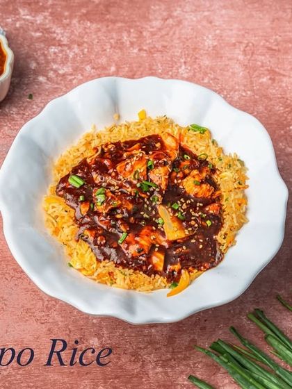 Dongpo Rice is another of our Asian fusion specialties. It features rice topped with a rich, dark gravy and tender pieces of chicken.