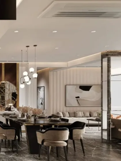 This open-plan living and dining area showcases how different zones can be connected through a cohesive design language, using consistent materials and a harmonious color palette.