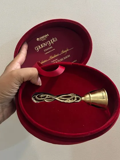 The official invitation to the Gaurav Gupta bridal couture show. Receiving this beautiful, custom bell was an honor and marked my entry into an exclusive industry event as a recognized stylist.