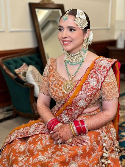 A beautiful portrait of Anureet, seated and looking serene.