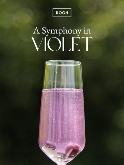 A Symphony in Violet. This sparkling gin-based cocktail is as magical as it looks, with delicate floral notes and a beautiful, shimmering hue.
