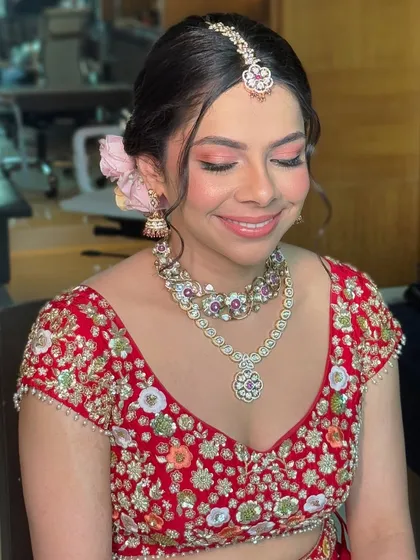 A beautiful shot showing the soft, peachy-pink eyeshadow and radiant blush that I used to create Malvika's glowing bridal look.