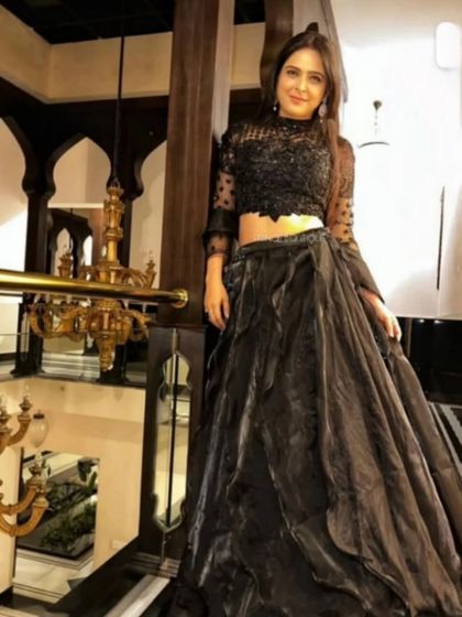 A duplicate of 171, showcasing the beautiful black lehenga gown.