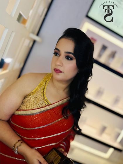 From my 'Glitz and Glam' series, this look is all about subtle sophistication for a party. I used soft, shimmering eyeshadow and a defined lip for an elegant finish.