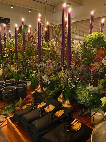 Another detail shot of the elegant place settings and lush floral decor from the intimate dinner party.